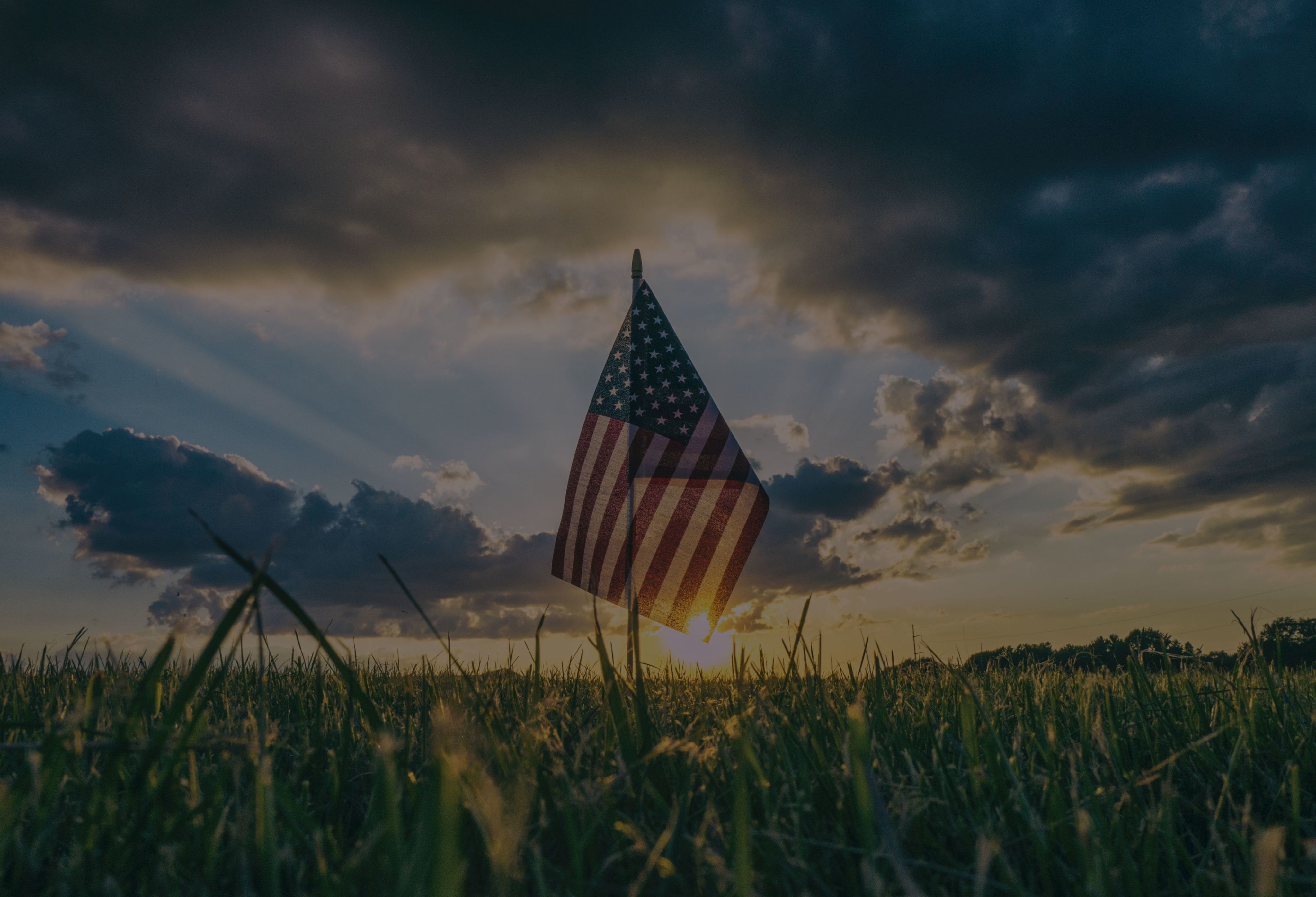 flag of USA on grass field