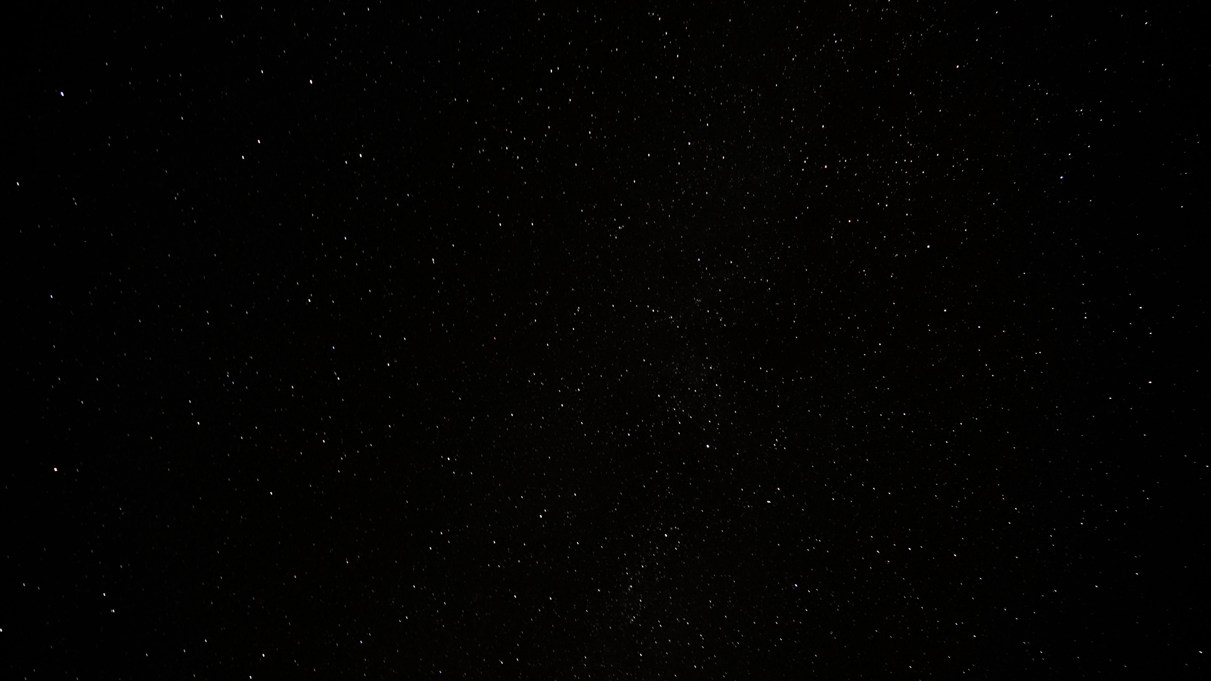 a black sky with a lot of stars
