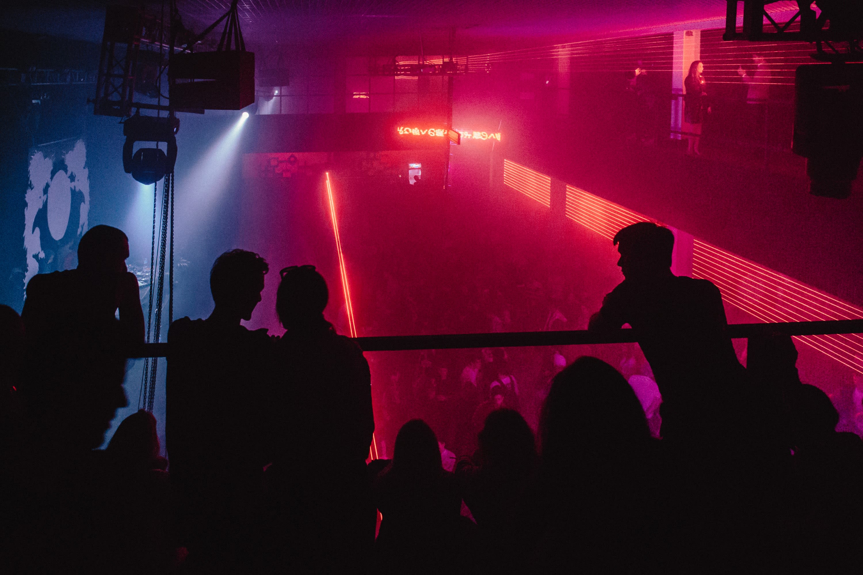 silhouette of people on stand
