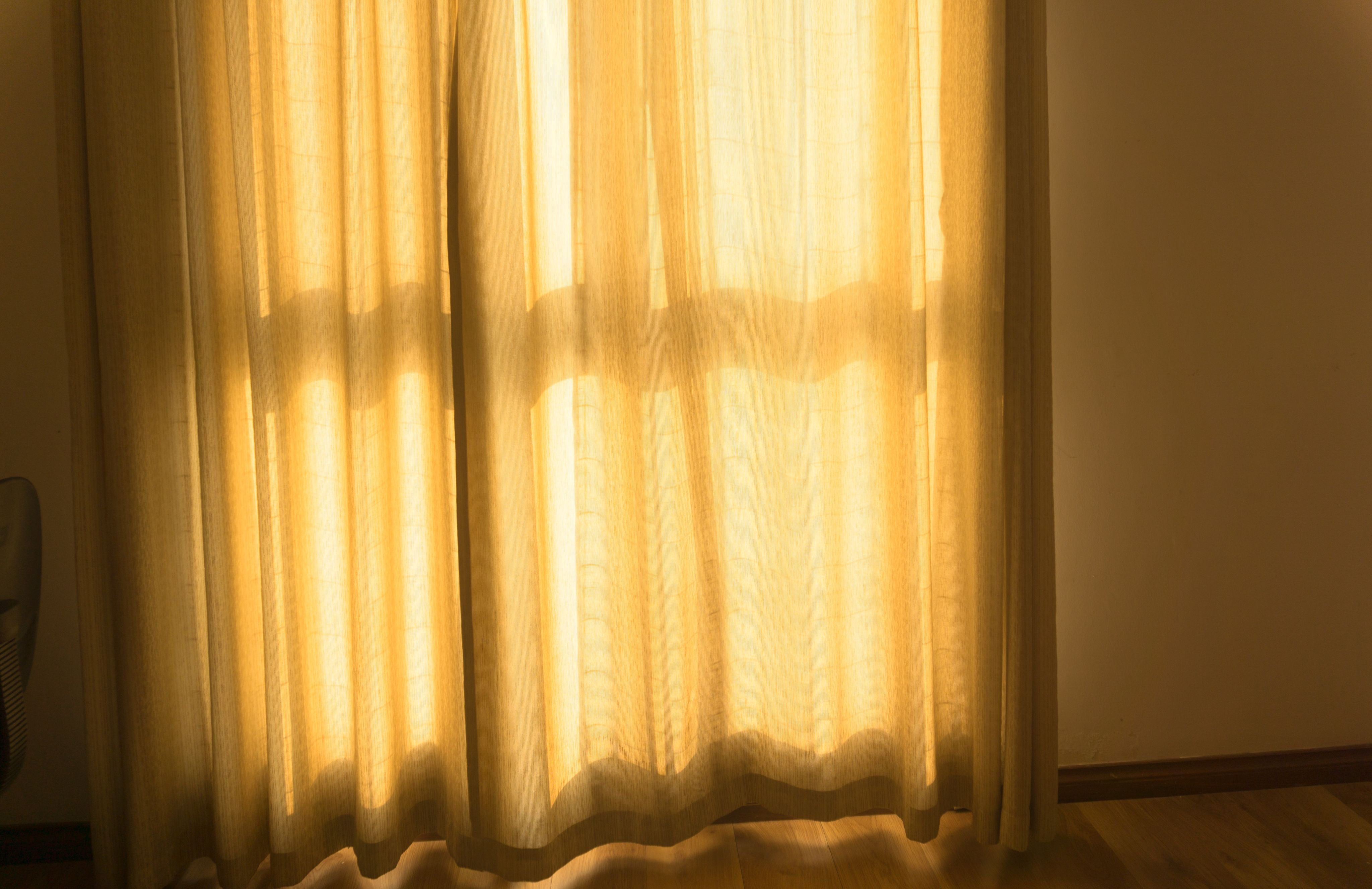 white window curtain during daytime