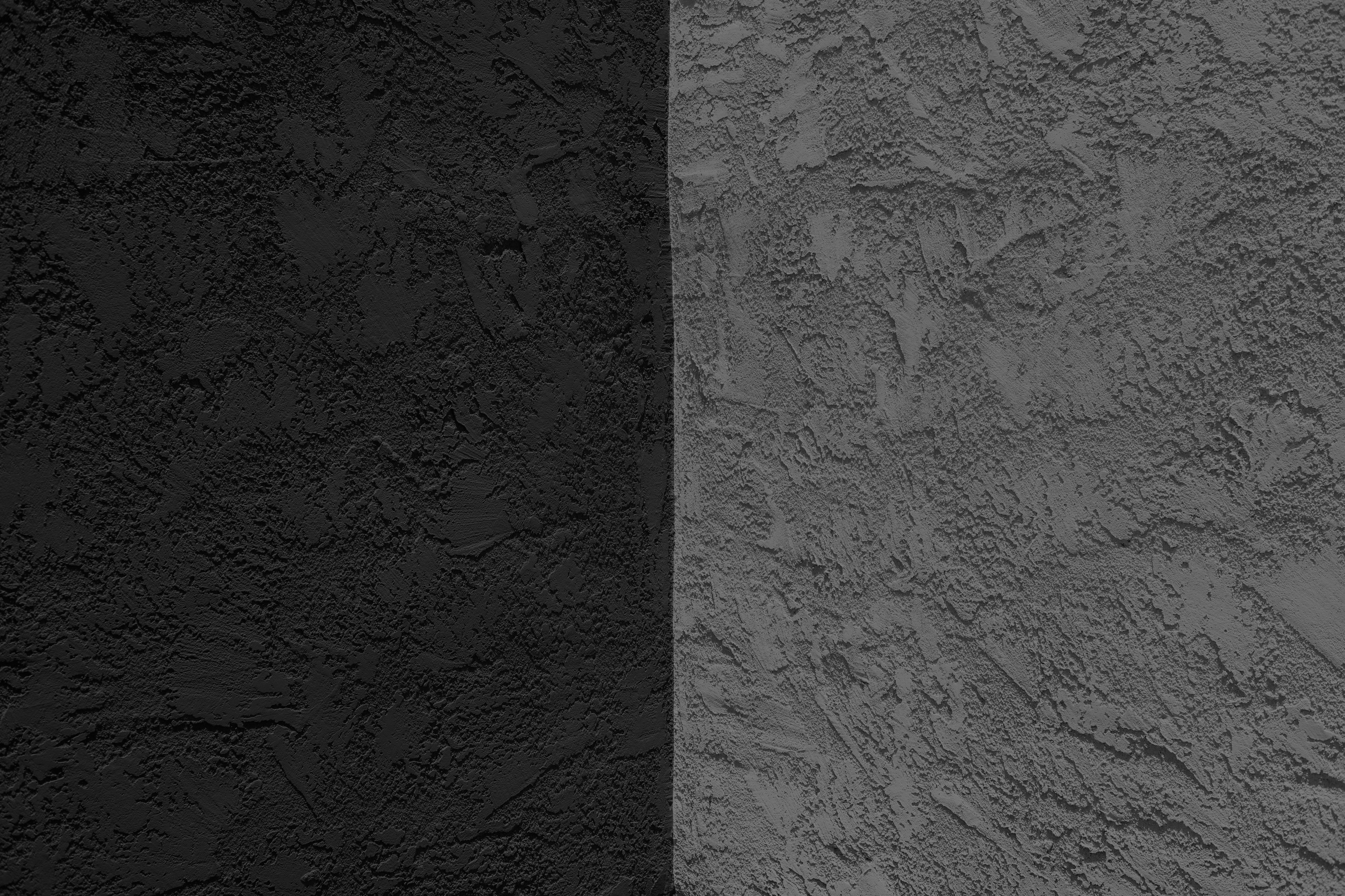 blue concrete wall with white paint