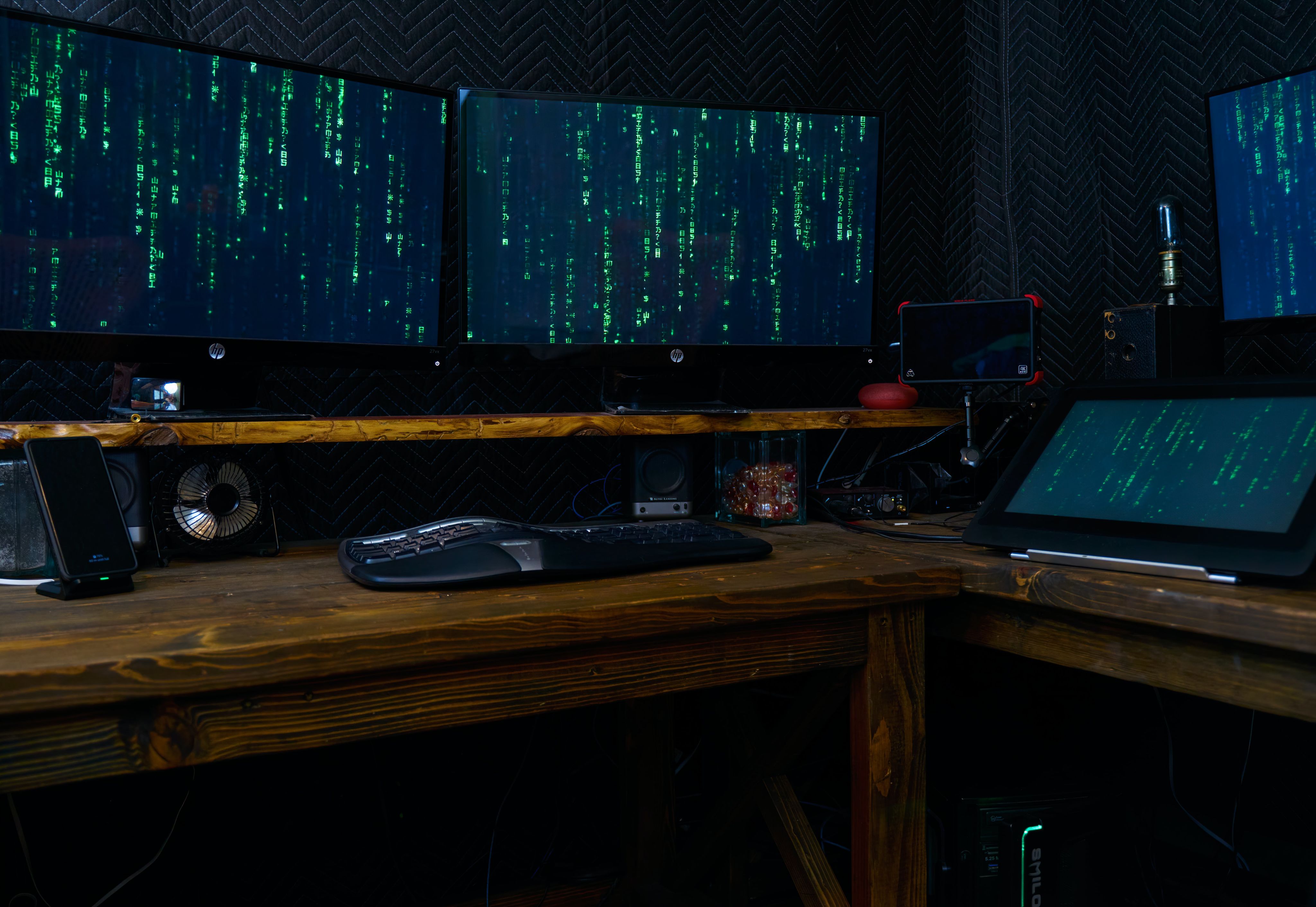 black computer keyboard on brown wooden desk