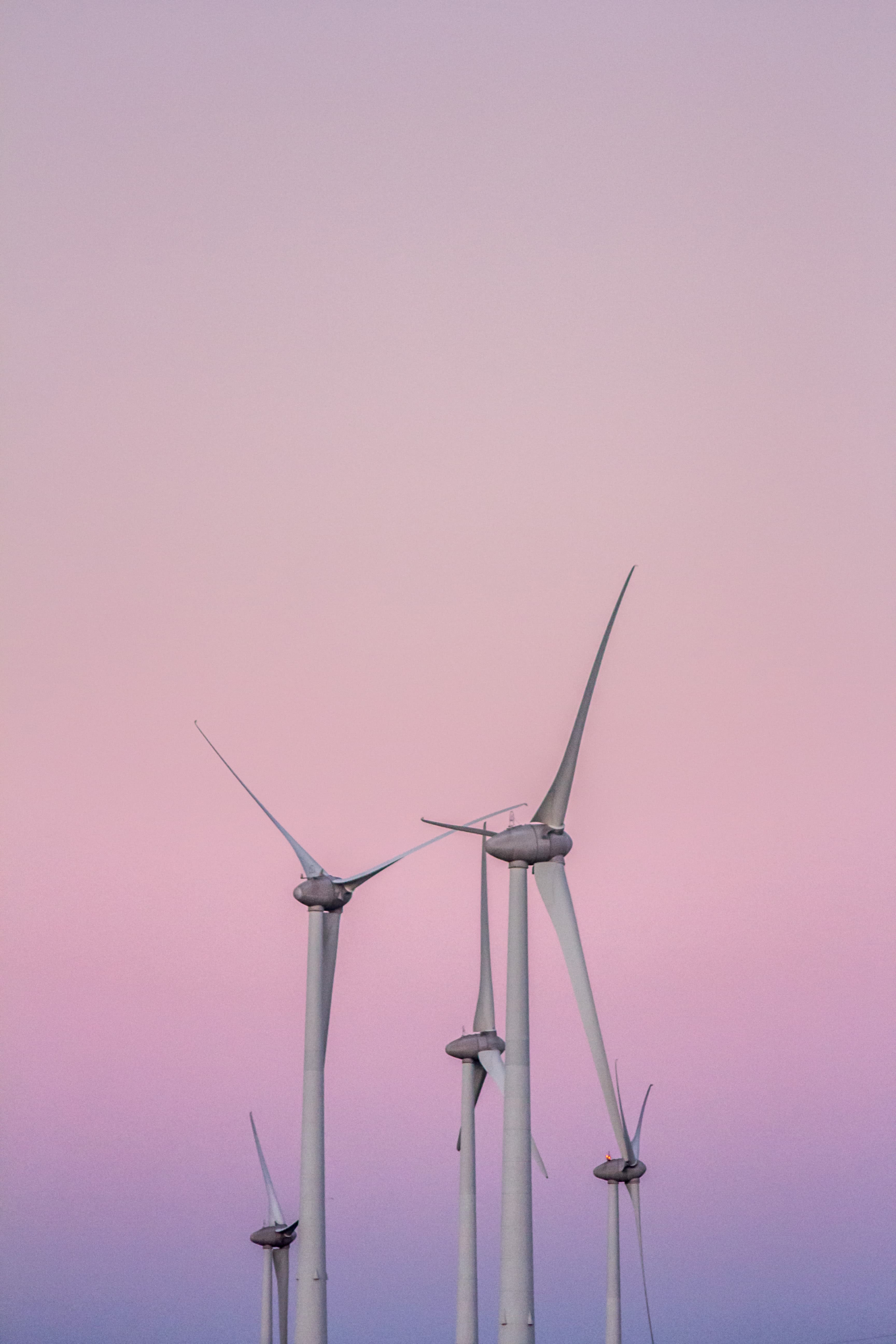 low angle photography of wind turbines